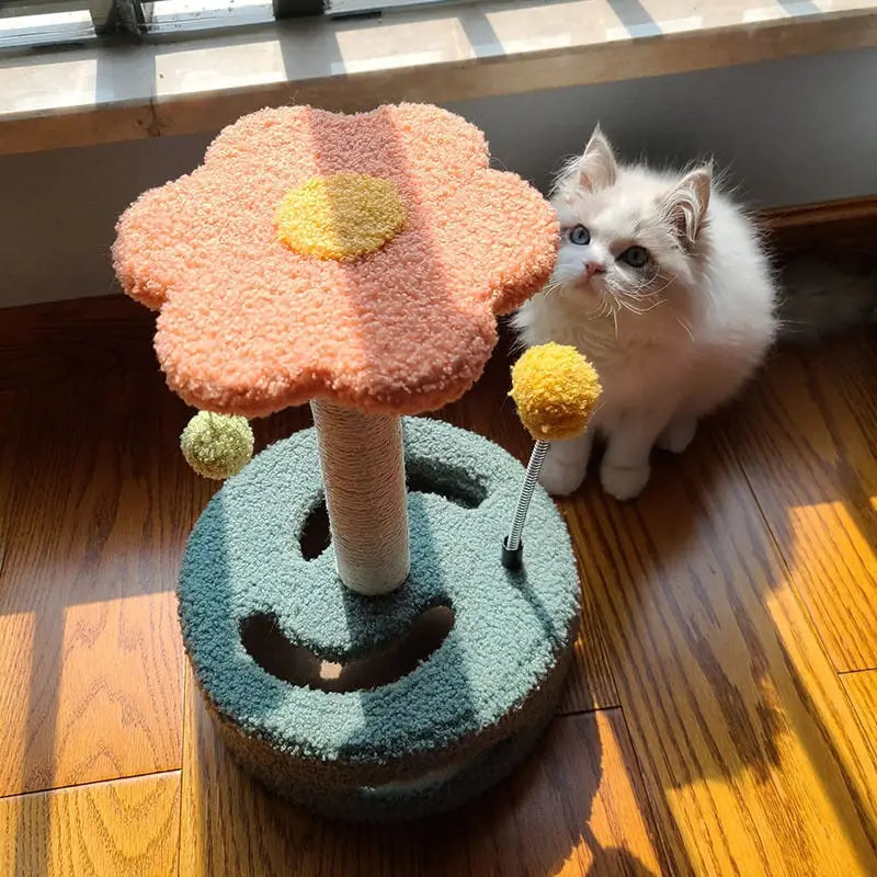 Poteau à gratter pour chat - Un amusant tournesol ajouté pour votre chat assis à côté d’un arbre à chat