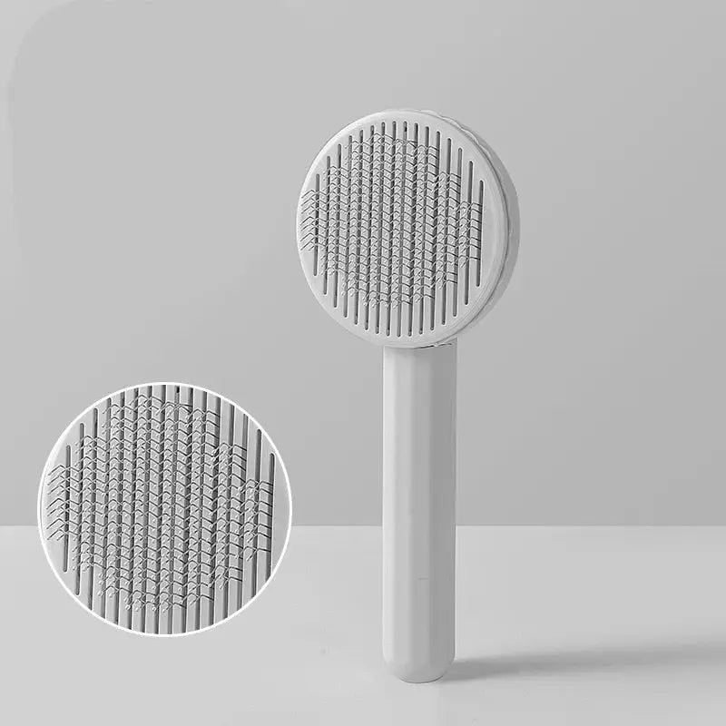 Peigne à chat - Design ergonomique pour le toilettage des Poils Morts - Brosse à dents blanche sur fond blanc